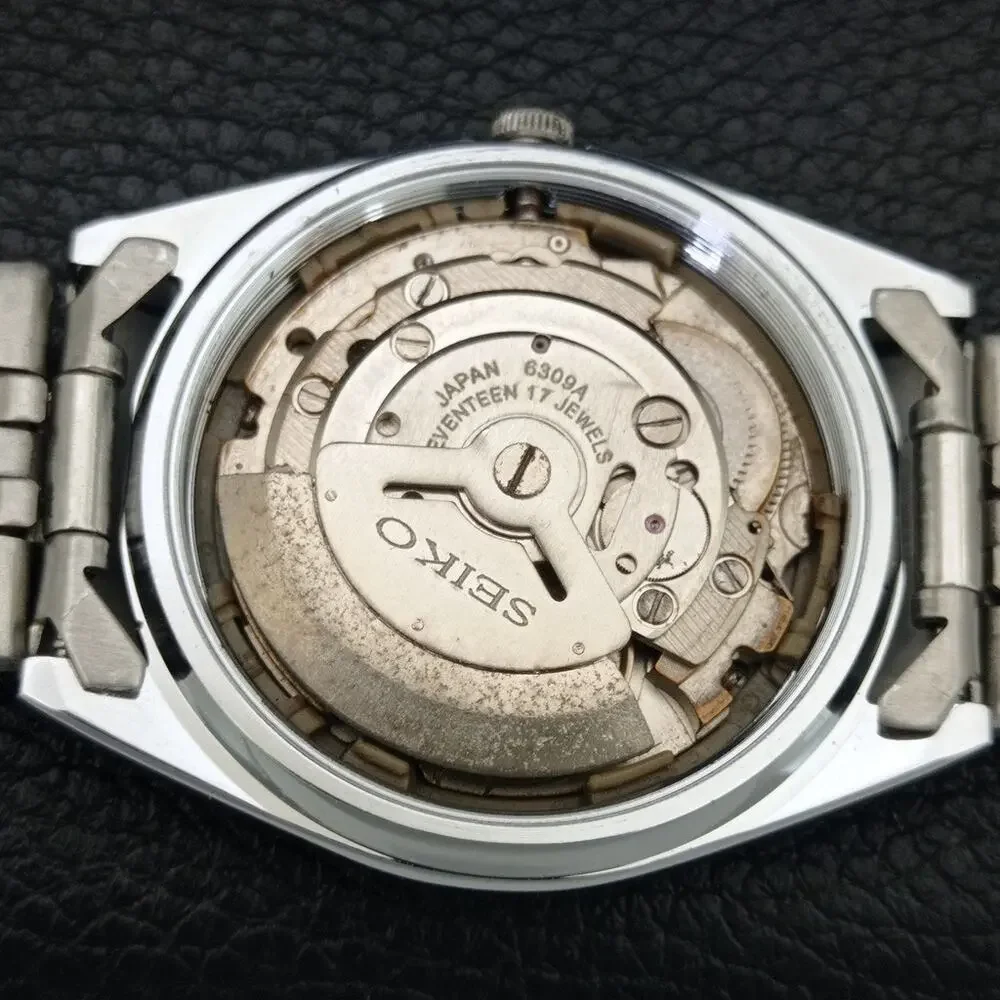 Vintage 1973 Seiko Automatic Mens Silver Watch W/daydate & Silver Accents